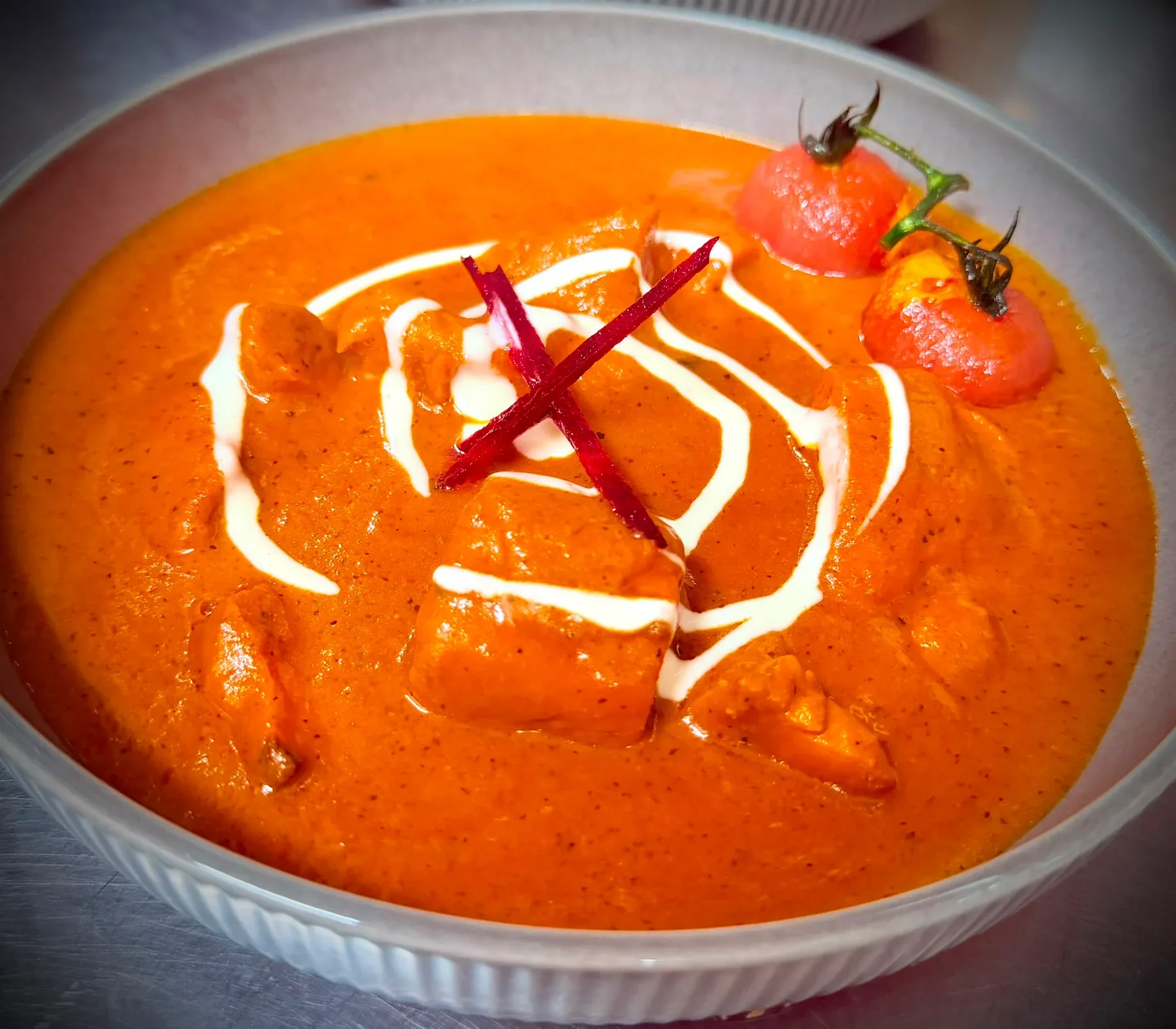 Curry dish prepared at TASSIE FLAME in Cambridge
